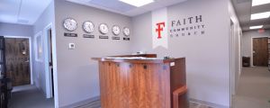 Faith Community Church Reception Area with clocks on the walls